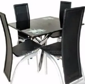 A Set of Glass Dinny Chairs Andtable