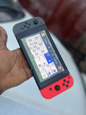 Nintendo Switch + Games Installed Both Fc26,Mk, Car Race Others