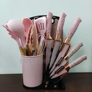 A Set of Pink Silicone Cooking Utensils and Kitchen Knives
