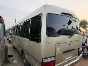 Toyota Coaster 2015 Gold