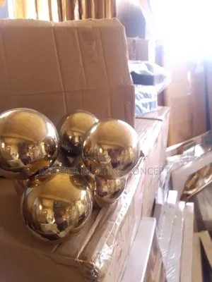 This Is a Gold-Colored Stainless Steel Gazing Ball Decor