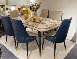 Quality and Imported Marble Top Dining Table by 6 Chairs