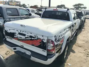 Toyota Tacoma 4dr Access Cab 6.1 ft. SB (2.7L 4cyl 5M) 2015 White