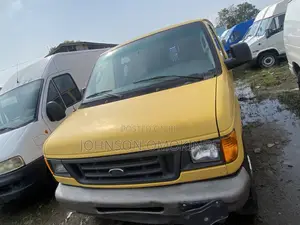Ford E250 2002 Yellow