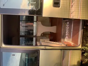 Toyota Coaster 2018 Gold