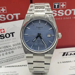 *Tissot  Men’S Battery‐Powered Silver Chain‐Strap Watch*