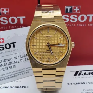 *Tissot  Men’S Battery‐Powered Gold Chain‐Strap Watch*
