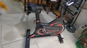 Red and Black Coloured Spinning Bike