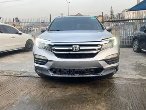 Honda Pilot Touring 4dr SUV 4WD (3.5L 6cyl 9A) 2016 Silver