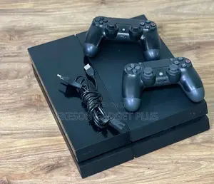 Neatly Used Uk Fat With 12 Games Fc26 and 2 Controllers