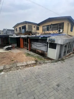 A Mixed-Use 2 Plots of Land With a Demolishable Structure on It