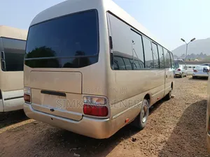 Toyota Coaster 2012 Gold