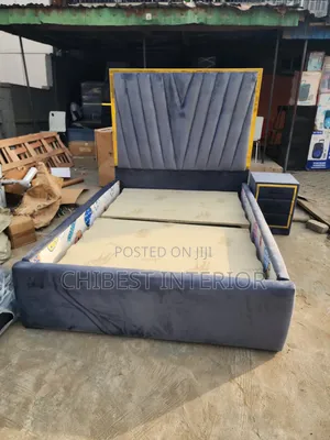 Grey Padded Queen Size Padded Bed.