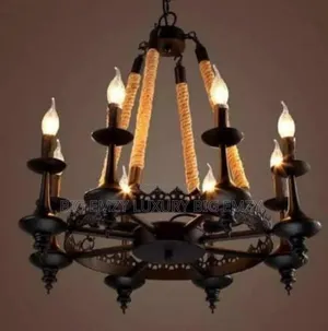 Wagon Wheel Chandelier or a Rustic Metal and Rope Pendant Chandelier.