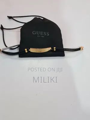 Guess Gold Plated Bracelet With Black Strap