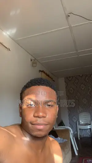 Male Store Assistant in a Drinks Shop