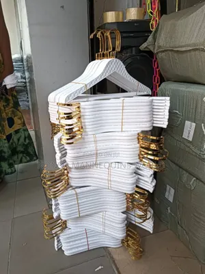 White Plastic Hangers With Golden Head