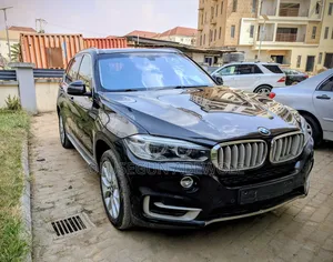 BMW X5 xDrive50i 4dr SUV AWD (4.4L 8cyl Turbo 8A) 2014 Black