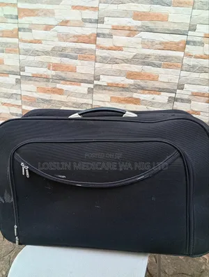 Spacious Black Rolling Travel Bag With Wheels