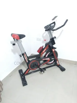 Spinning Exercise Bicycle With Display Meter , iPad and Phone Holder