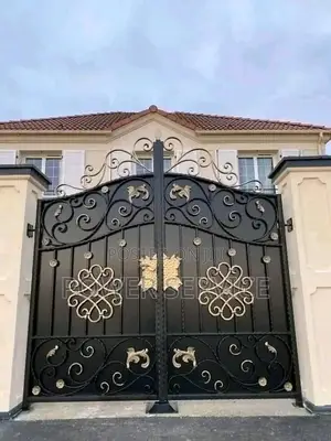 Ornate Black and Gold Wrought Iron Drive Gate