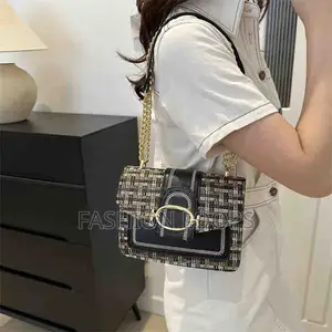 Metal Chain Lock Shoulder Bag