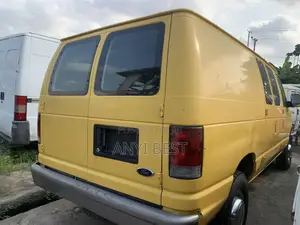 Ford E250 2004 Yellow