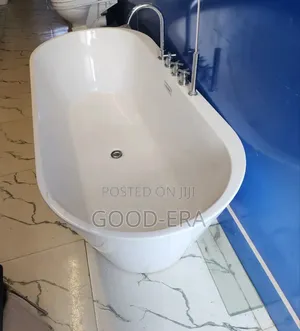 Oval Free Standing Bath Tub With Mixer
