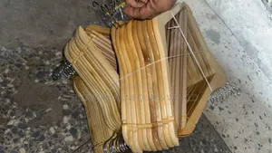 Neat Packs Of Wooden Clothing Hangers
