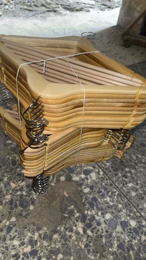 Neat Packs Of Wooden Clothing Hangers