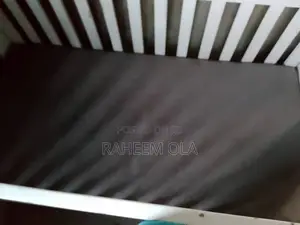 A Very Good and Used Baby Cot