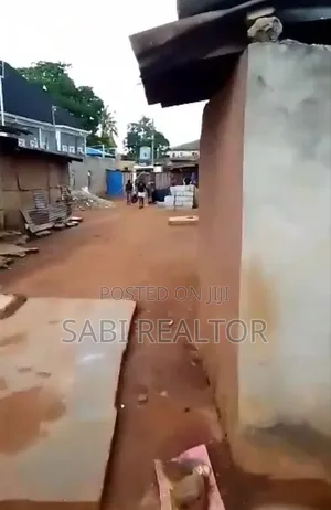 1 Half Plot of Land at Alaguntan at a Street Beside Access Bank