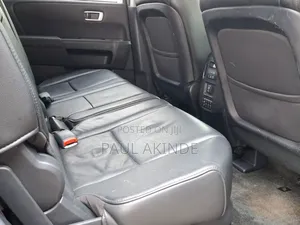 Honda Pilot Touring w/RES/Navi 4WD (3.5L 6cyl 5A) 2013 Burgundy