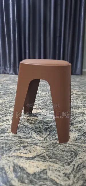 These Are Modern, Stackable Plastic Stools With Cushioned Seats.