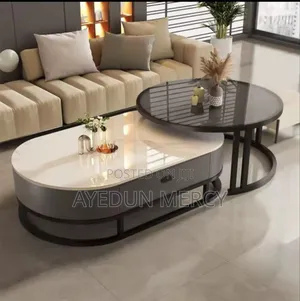 Mable Oval Center Table With Drawer