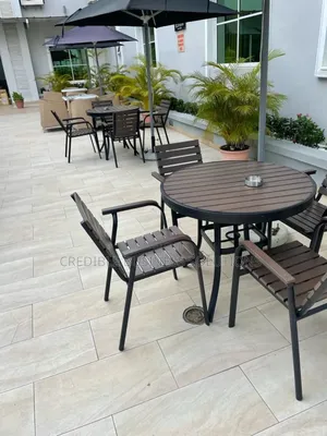 Quality Outdoor Dining Table by 4 Chairs