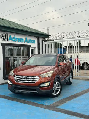 Hyundai Santa Fe Limited 4dr SUV AWD (3.3L 6cyl 6A) 2014 Orange