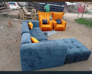 A Standard Living Room Couch With 2 Singles
