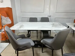 Marble Dining Table and Four Seaters