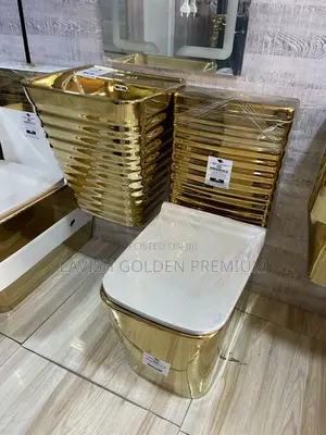 Brand New Gold Back to Wall Soft Close Water Closet With Hanging Basin