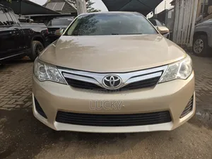 Toyota Camry LE 4dr Sedan (2.5L 4cyl 6A) 2012 Gold