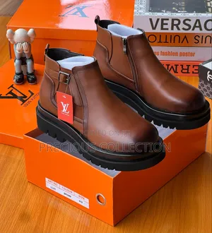 Loius Vuitton Double Sole Buckle Round Face Leather Boot.