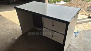 Modern Office Table With Storage Drawers and Slatted Front Design