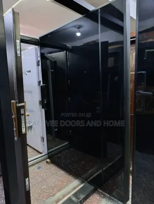 4ft by 7 Imported Black Pivot Door