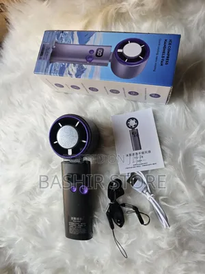 Portable Handheld Fan With Ice Compress Cooling Technology.