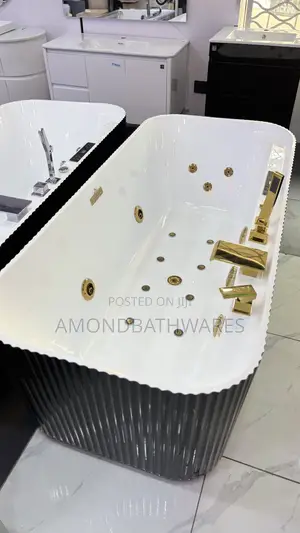 Black White Jacuzzi With Gold Fittings