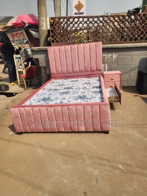 Pink Coloured 4.5by6 Bed With Side Drawers