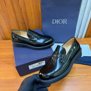 Luxury Update  
Christian Dior Black Carlo Loafers.