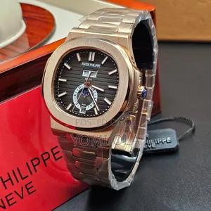 Patek Philippe Nautilus White Dial Gold Wristwatch