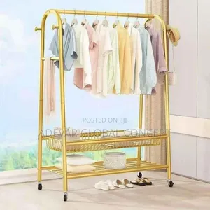 Golden Mobile Cloth Hanger With Storage Space